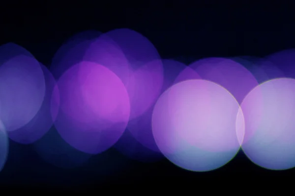 Bokeh purple lights closeup background — Stock Photo, Image