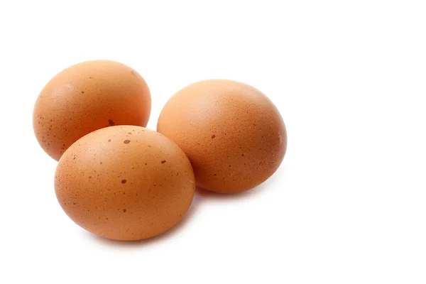 Chicken eggs closeup on white background — Stock Photo, Image