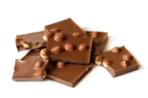 Tumpukan coklat dengan kacang — Stok Foto
