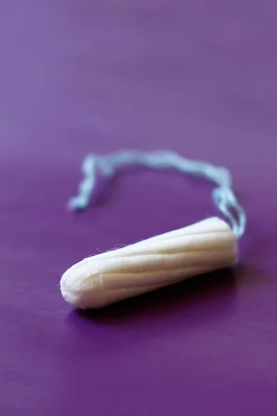 Tampon - feminint hygiejneprodukt - Stock-foto