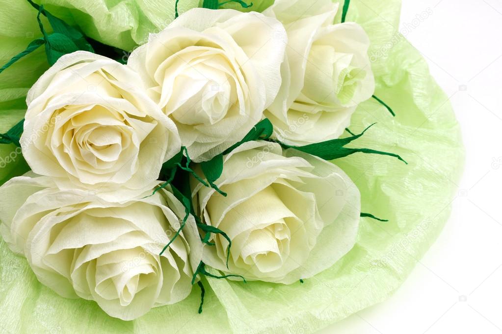 Paper white roses for Valentine's Day on white background