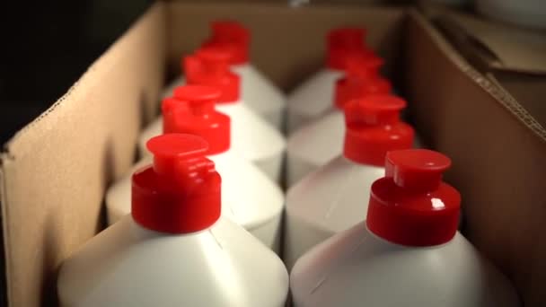 Cosmetic spray packaging at a store warehouse. Wholesale trade in lotions, cosmetics for hygiene. selective focus — Stock Video