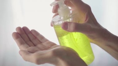 Old Mans Hands Use Sanitizer. Measures to Prevent Spread of Virus