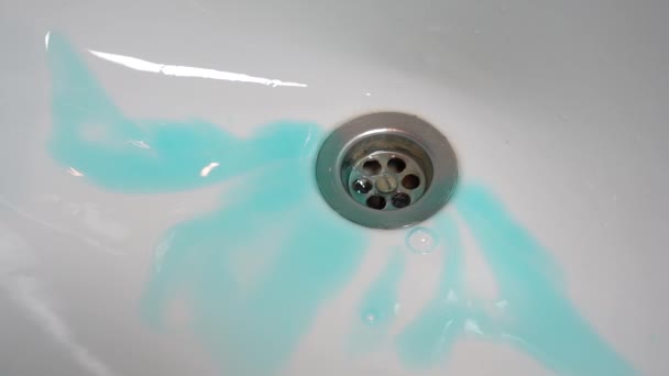 Blue Gel Sloo Drain Into Sink Drain — стоковое видео