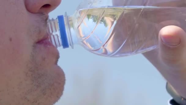 Drink Clean Water from a Bottle. Thirst Quenching. Close-up — Stock Video