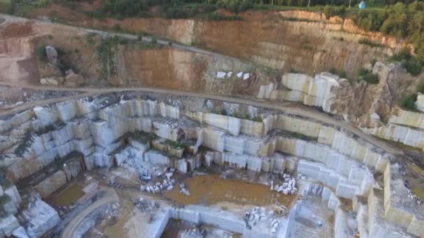 Aerial view of a large marble quarry during sunset — Stock Video