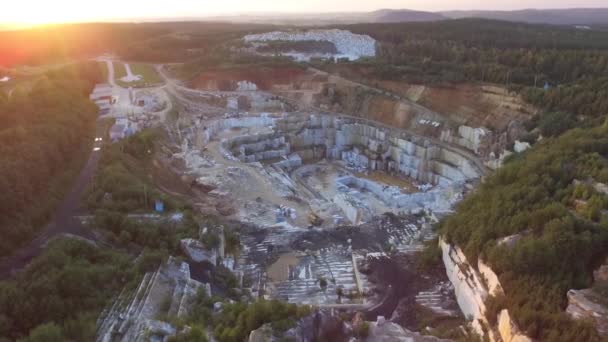 Aerial view of a large marble quarry during sunset — Stock Video