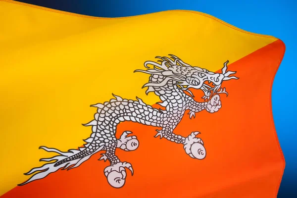 ブータン王国の国旗 この旗はチベット仏教のドゥルカパ系統の伝統に基づいており ドルク ブータン神話のサンダードラゴンを備えています — ストック写真