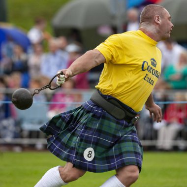Hammer Throwing event at the Cowal Gathering. A traditional Highland Games held each year in Dunoon in Scotland. clipart