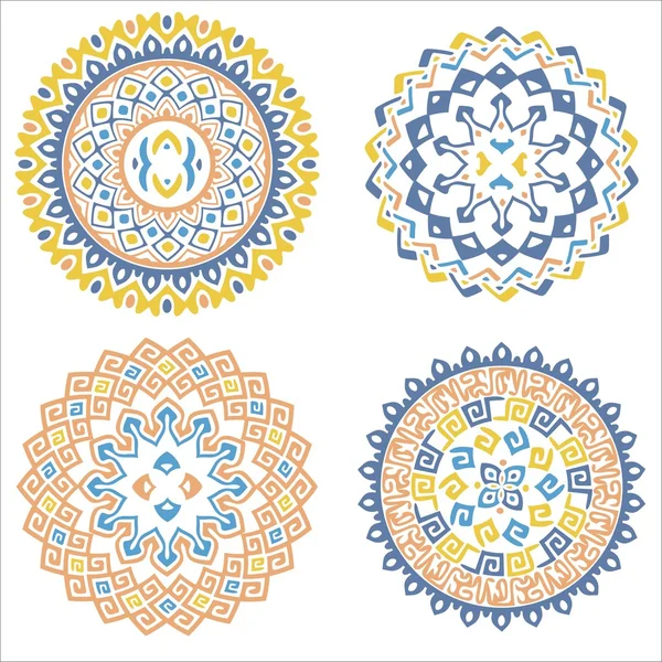 Collection of bright colorful geometric round ethnic decorative elements. — Stock Vector