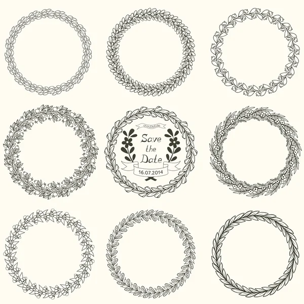 Set of vector round floral handdrawn wreaths — Stock Vector