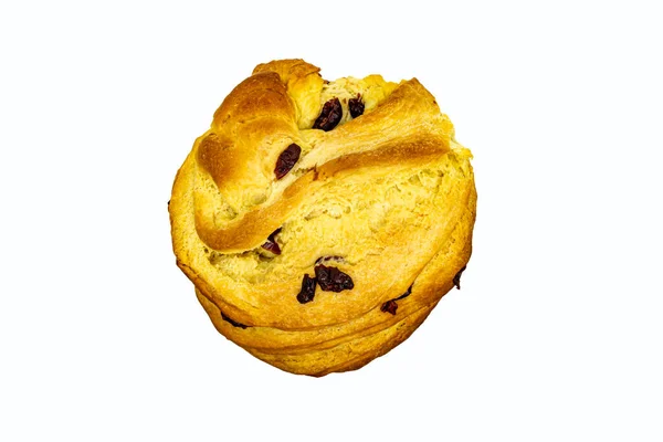 Bun with raisins on a white plate, top view — Stock Photo, Image