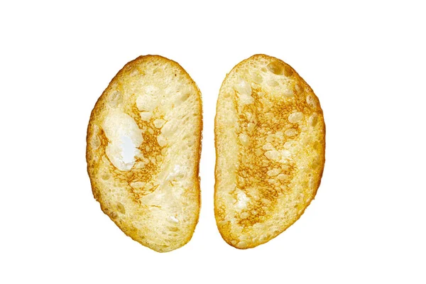 Duas torradas de trigo em um fundo branco close-up — Fotografia de Stock