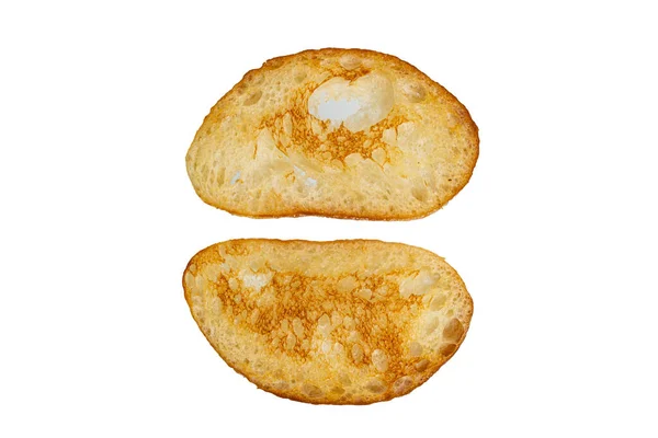 Duas torradas de trigo em um fundo branco close-up — Fotografia de Stock