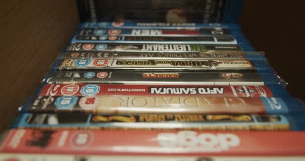 Man Browsing Blu Ray Dvd Movies Collection Watching Films Quarantine — Stock Video