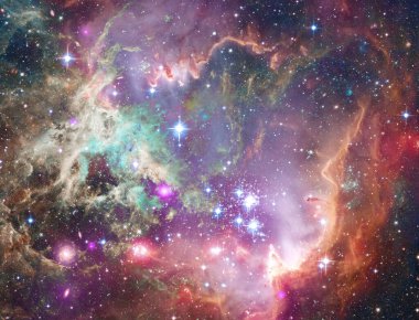 ESA 'nın Herschel Uzay Gözlemevi' nden gelen bu görüntü Rosette nebulasının bir parçasını gösteriyor. Dünya 'dan 5.000 ışık yılı uzaklıkta, tek boynuzlu at takımyıldızında..