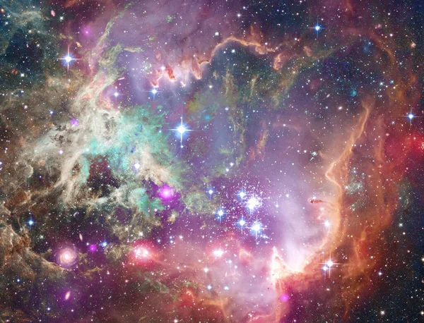 ESA 'nın Herschel Uzay Gözlemevi' nden gelen bu görüntü Rosette nebulasının bir parçasını gösteriyor. Dünya 'dan 5.000 ışık yılı uzaklıkta, tek boynuzlu at takımyıldızında..
