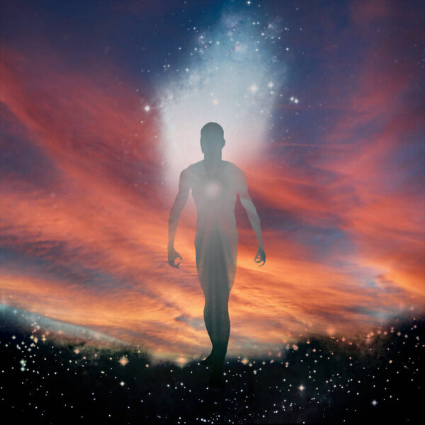 Human Figure Emerges from Light. Spirit or Aura