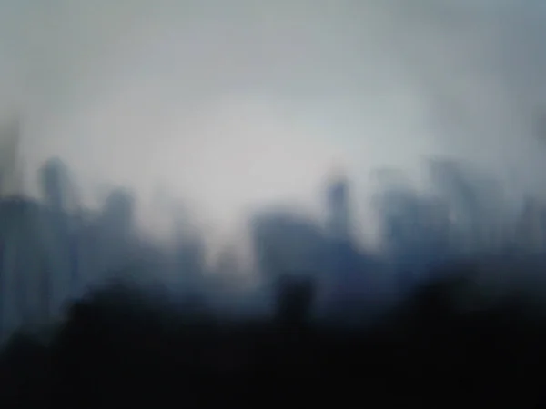 都市のスカイラインの背景がぼやけている — ストック写真