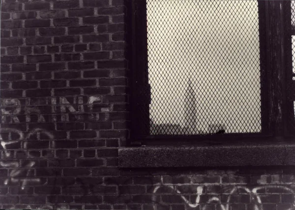 Brick Wall Writings Bars Window — Stock Photo, Image