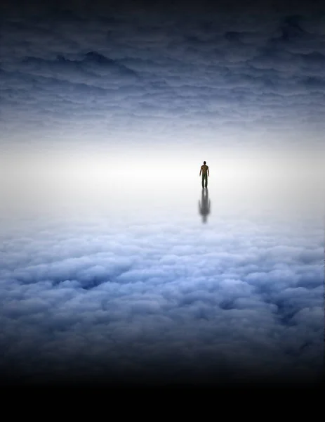stock image Tiny man in large white cloud filled space