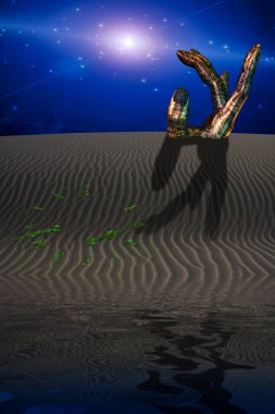 el saati ile çölde gömülü heykel