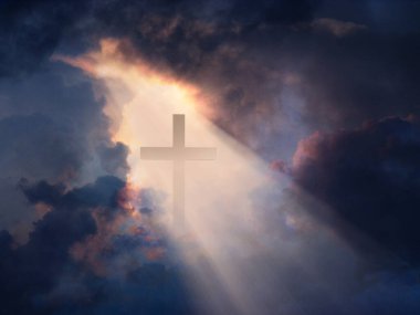 Cross revealed in dramatic sky