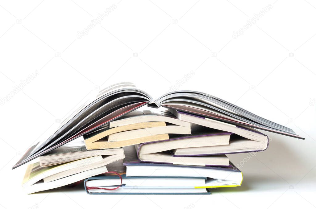 Stack of hardcover books on white background