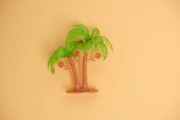 Juguete Palma Plástico Sobre Fondo Naranja —  Fotos de Stock