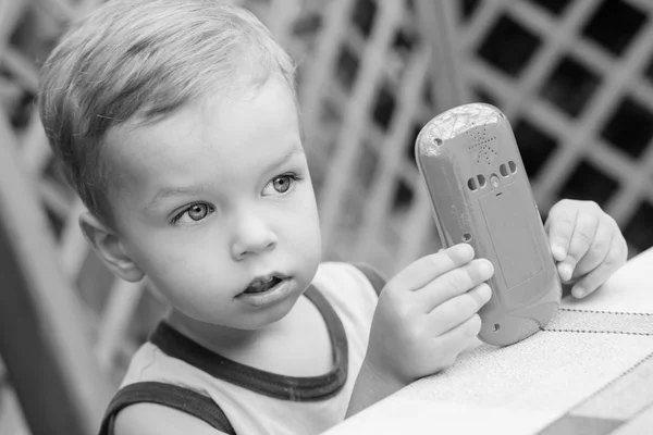 Portrait of cute little boy playing — Stock Photo, Image