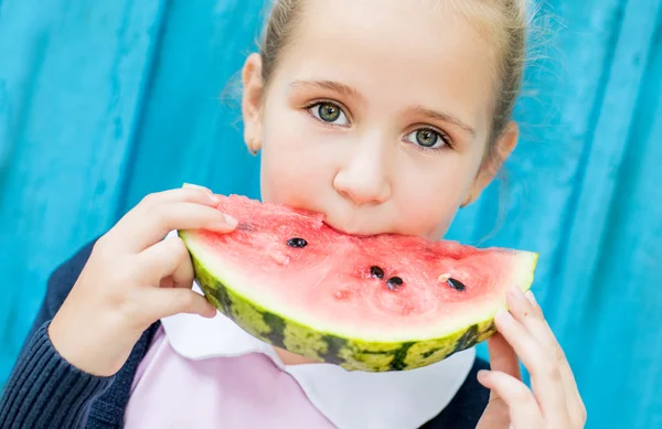 Funny child eating watermelon — Stock Photo, Image