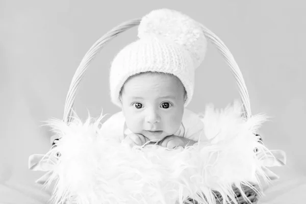 Cute newborn baby in knitted cap — Stock Photo, Image