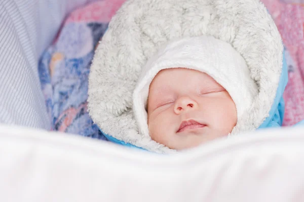 Newborn baby sleeping in a stroller — Stock Photo, Image