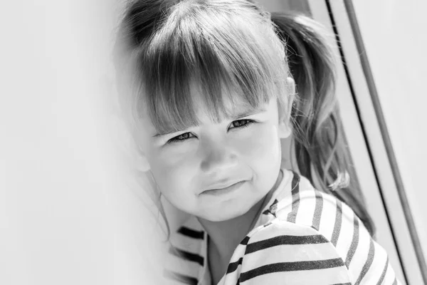 Portrait sad little girl sitting — Stock Photo, Image