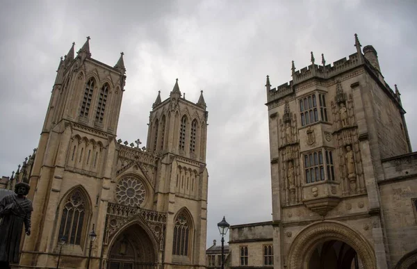 Old historic architecture of Bristol cathedral and cloudy sky