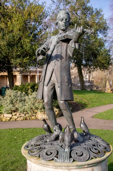 Young Mozart Statue Park Cloudy Sky Background — Stock Photo, Image