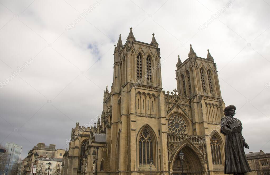Old historic architecture of Bristol cathedral and cloudy sky