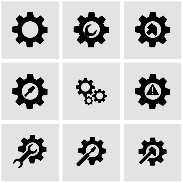 Vector black tools in gear icon set — Stock Vector