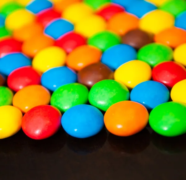 Pills in a multi-colored glaze — Stock Photo, Image