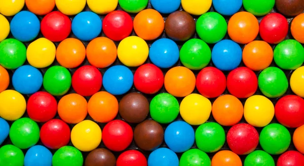 Pills in a multi-colored glaze — Stock Photo, Image