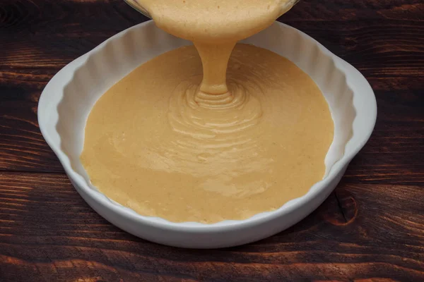 Liquid Sponge Dough Poured Pot Baking Dish Close Brown Wooden — Stock Photo, Image