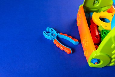 Colorful toys on a blue background