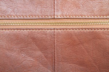 Kahverengi deri ve dikiş