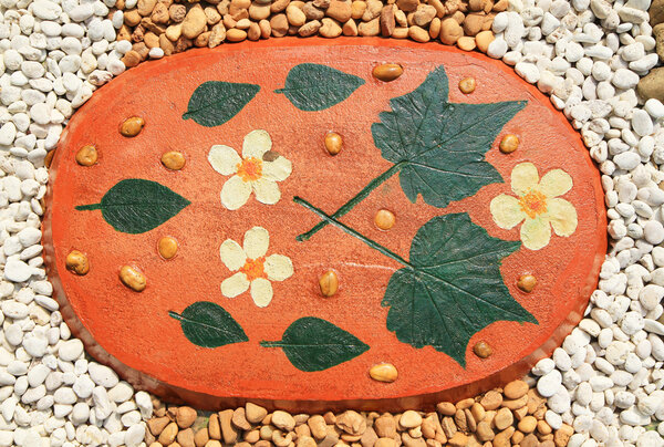 Tiled floor decorated with sand stone