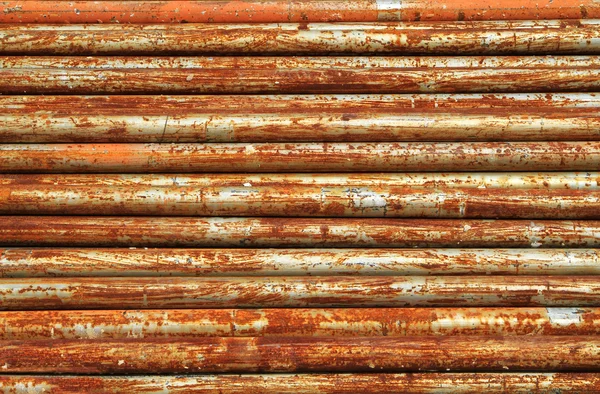 Stack of rusty metal pipes — Stock Photo, Image