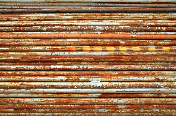 Stack of rusty metal pipes — Stock Photo, Image