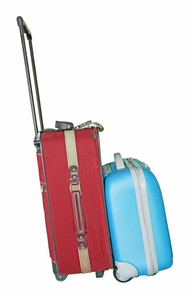 Rotes und blaues Reisegepäck isoliert auf weißem Hintergrund — Stockfoto
