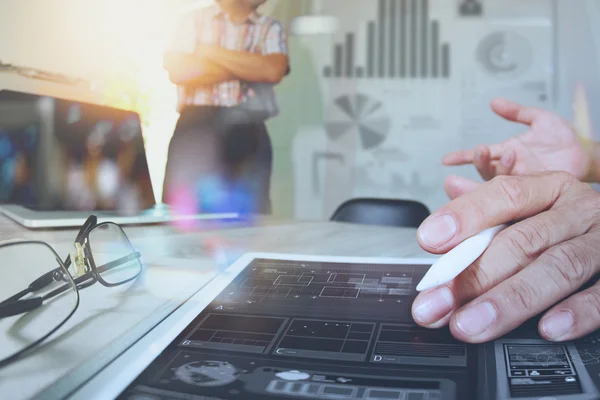 Two colleague sweb designer discussing data and digital tablet a — Stock Photo, Image