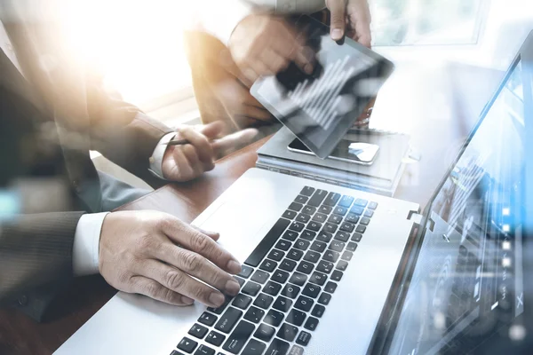 Business documents on office table with smart phone and laptop c — Stock Photo, Image