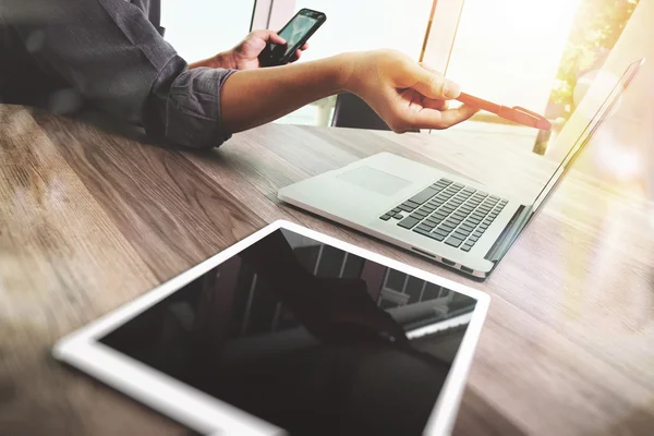 Businessman hand touching digital tablet.Photo finance manager w — Stock Photo, Image